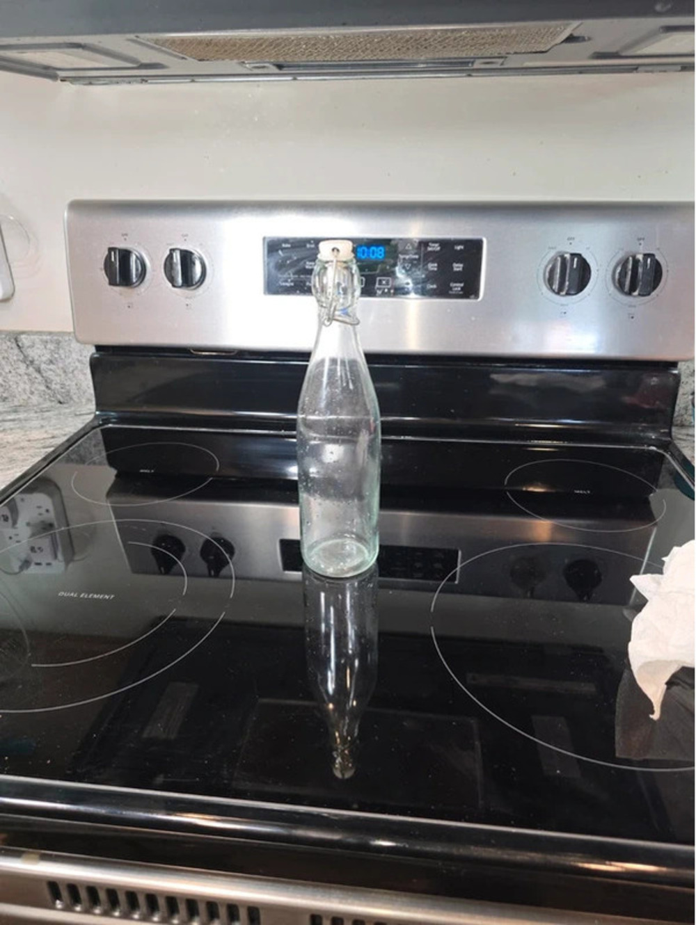 Vintage Clear Glass Bottle with Swing Top Closure